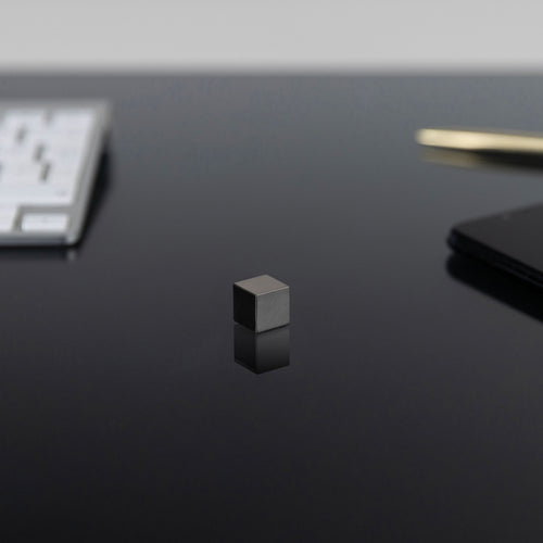 0.5-Inch Niobium Cube on a black background